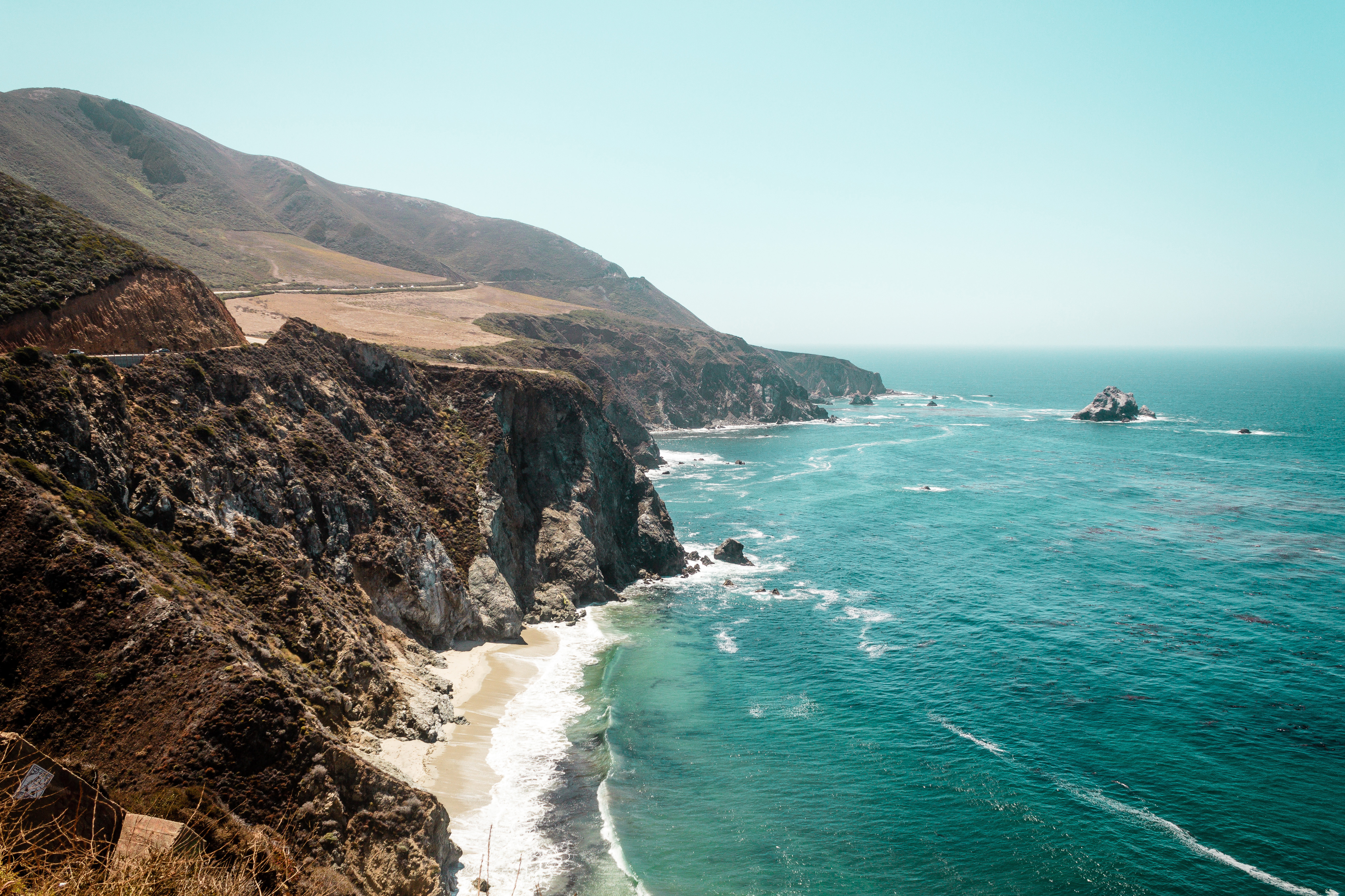 California coast with oceans coming in at cliffs and beach